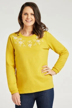 Long Sleeve Embroidered Flower Neckline Top