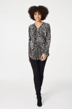 Stella Morgan - Long Sleeve Zip Neck Animal Print Top -Mod Vanta Sales Store 9004463 07201